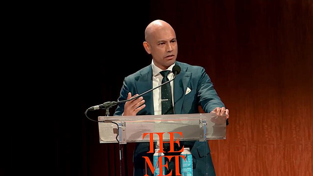 Man speaking at podium