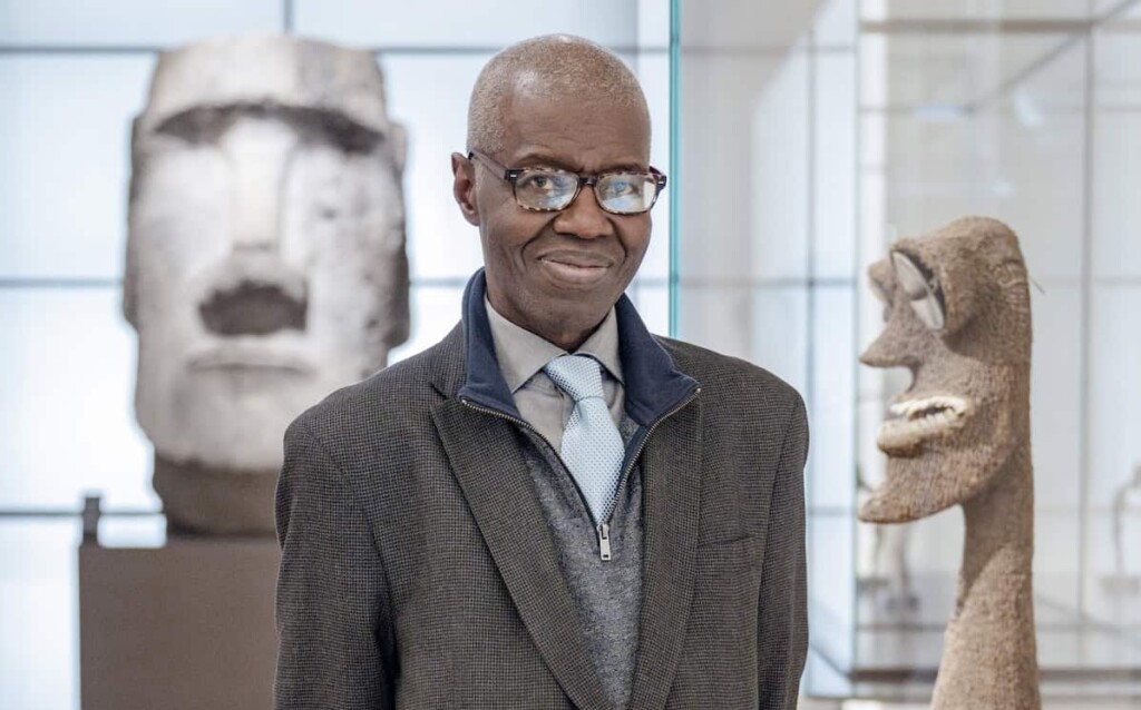 Portrait of Souleymane Bachir Diagne in a museum gallery.